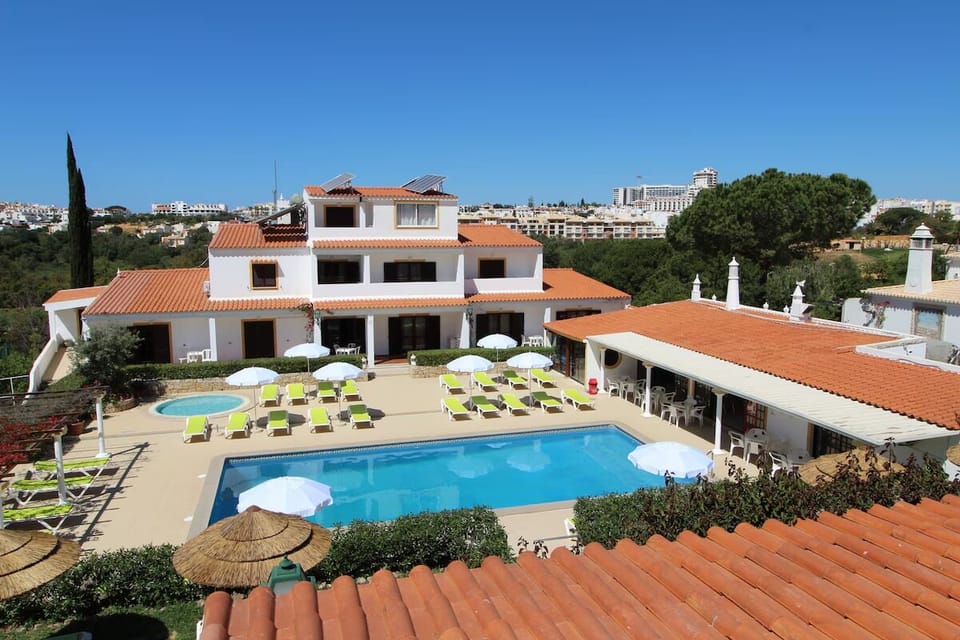 Soak up the day beside the sparkling pool and loungers.
