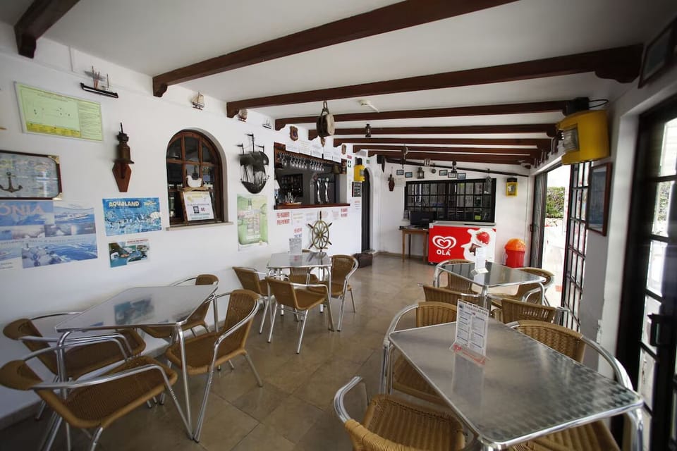 Gather for drinks and light bites in the airy lounge.