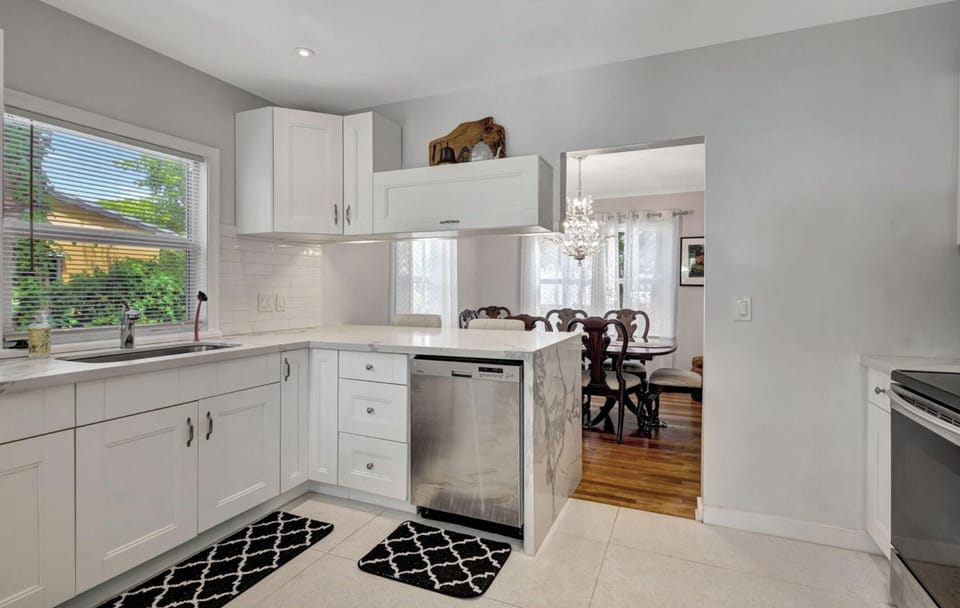 The modern, updated kitchen has all the essentials to make your meals for everyone to enjoy.