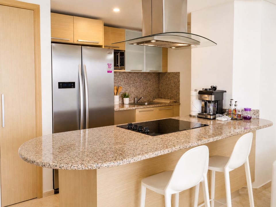 Fully equipped modern kitchen — ideal for longer stays and home-cooked meals. Washer and dryer included.