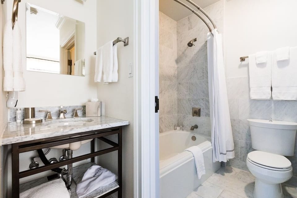 Refresh in a marble bath with fluffy towels, spa calm.