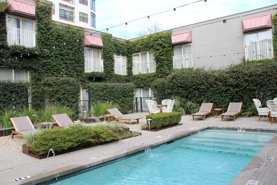 Unwind under sparkling lights beside the resort-style pool.