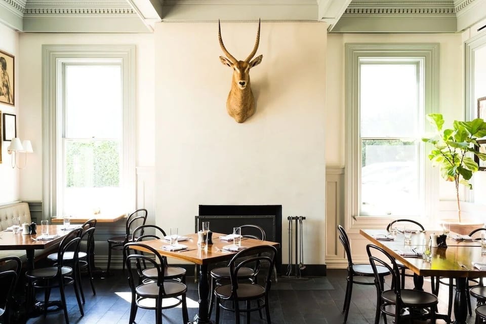 Linger by the fireplace for cozy, intimate meals and conversation.