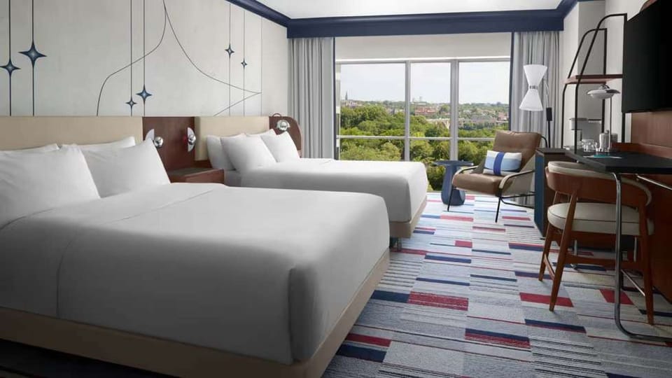 Superior Queen Room: Two queen beds, lounge armchair &amp; floor-to-ceiling window view
