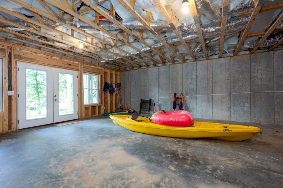 Basement- 2 person kayak, float, life jackets, pool noodles, fishing gear