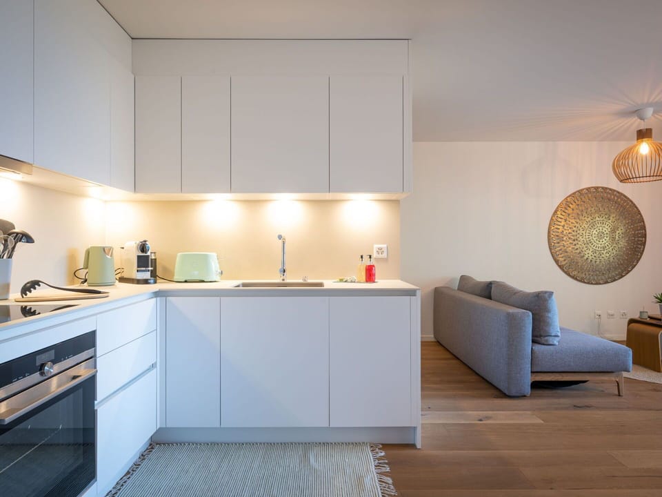 Kitchen, Countertop, Furniture, Interior Design, Kitchen Appliance, Flooring, Cabinetry, Wall, Light Fixture, Wood