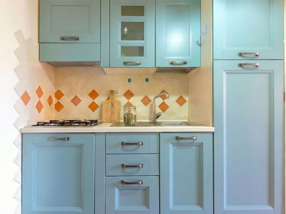 Cabinetry, Kitchen, Kitchen Appliance, Major Appliance, Cupboard, Furniture, Drawer, Countertop, Stove, Paint