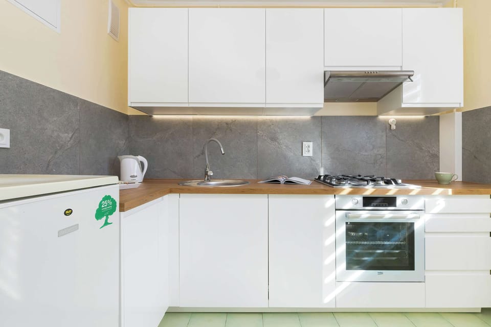 A modern fully equipped kitchen for preparing home-cooked meals.