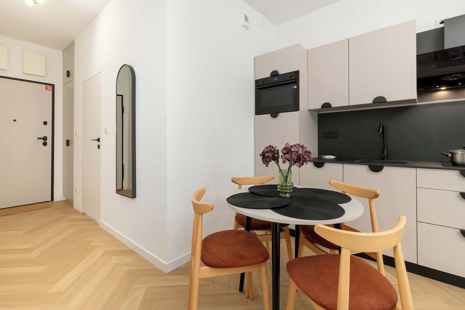 A practical hallway with a mirror and spacious wardrobe makes getting ready a breeze.

