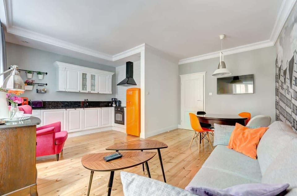 A dining table with chairs provides a perfect spot for enjoying meals.