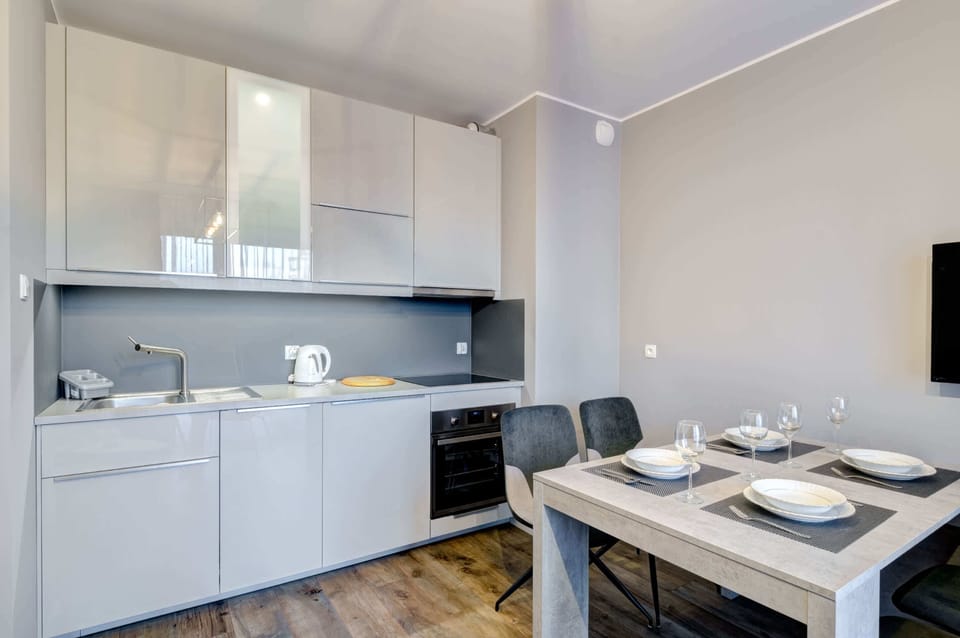 The fully equipped kitchenette includes everything you need for a home-cooked meal.