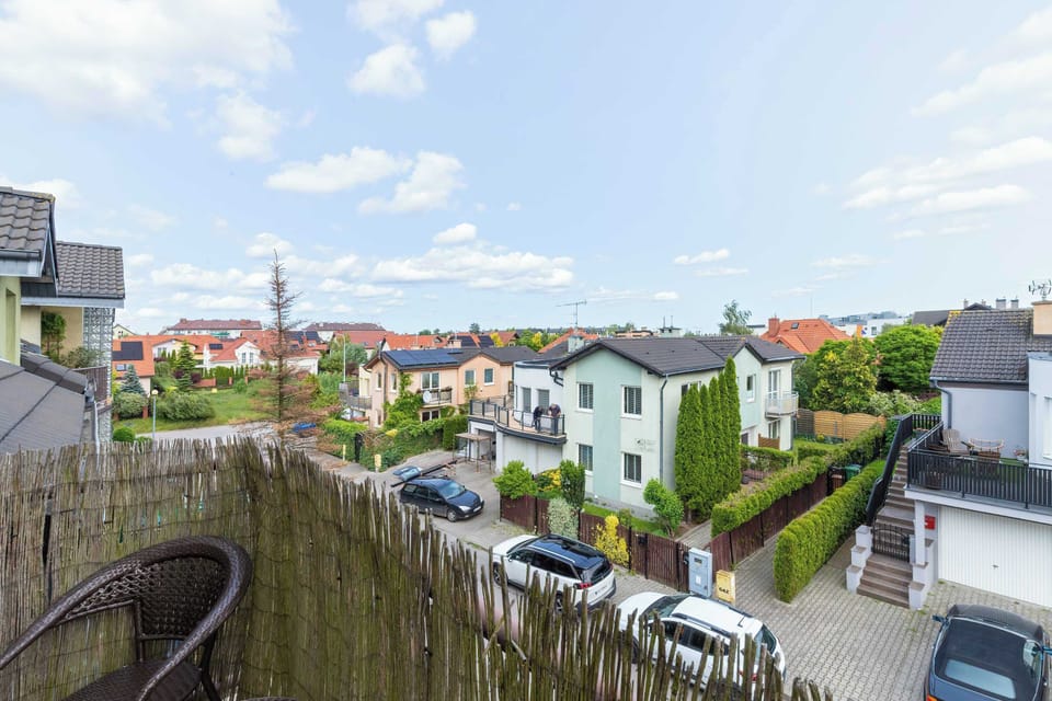 Balcony provides a pleasant view over the quiet, green neighborhood.