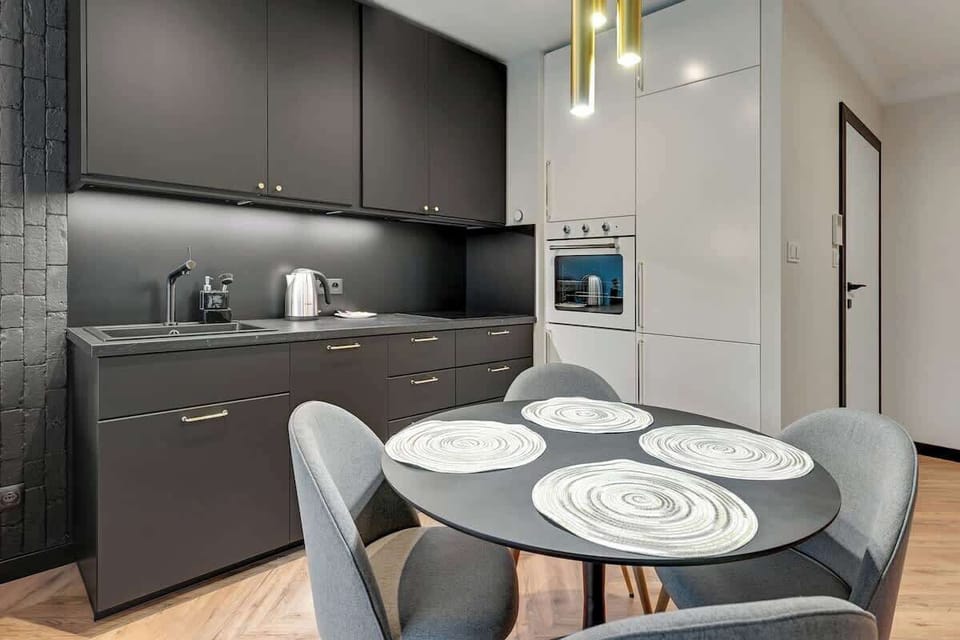 Sleek minimalism, with its matte finishes, understated elegance, and a harmonious blend of modern sophistication and functional design.