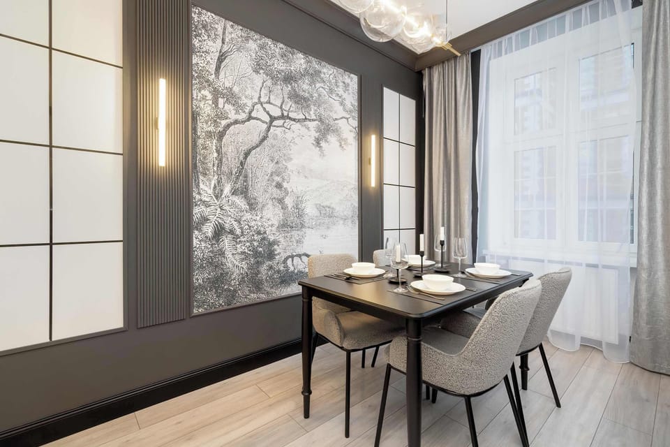 The living room's modern furnishings create a welcoming atmosphere.