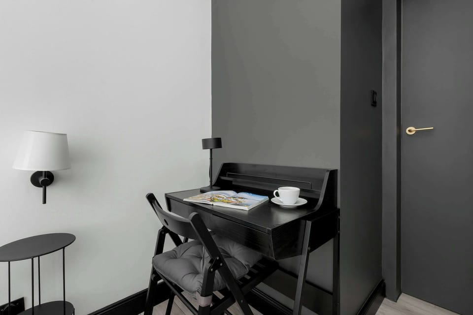 Rest peacefully in the spacious bedroom with a comfy bed.
