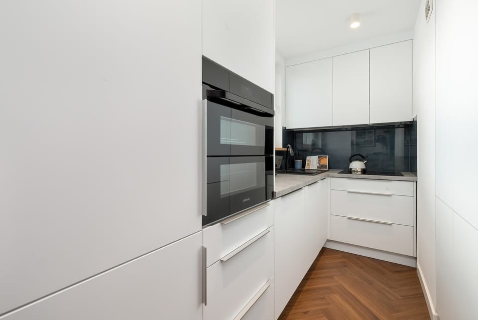 Compact and practical kitchen with ample counter space.