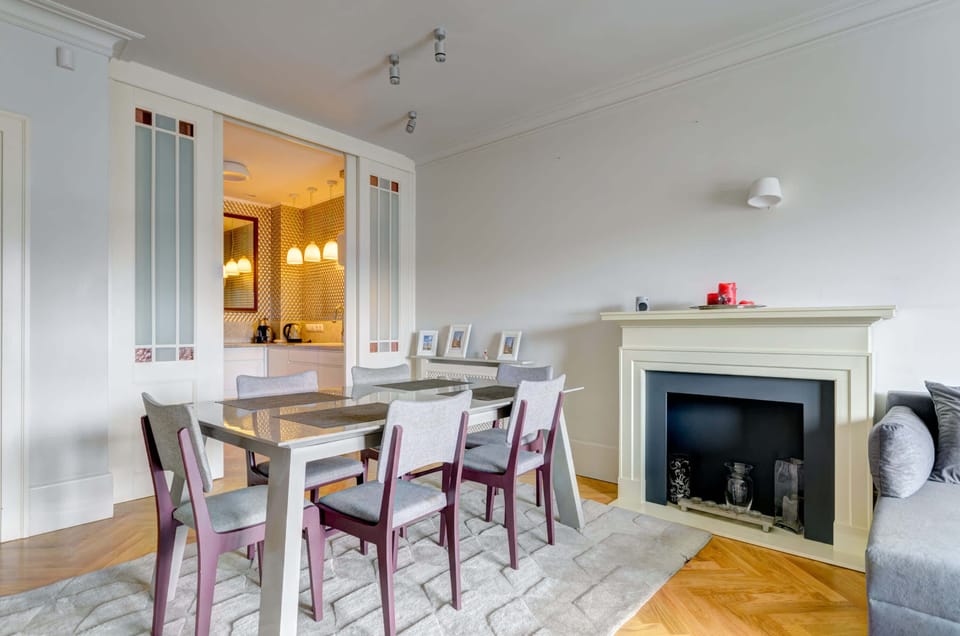 A dining space with a table and chairs, blending seamlessly with the living area.