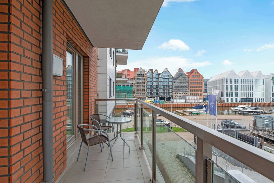 These examples showcase how a cozy balcony with a marina view can enhance the ambiance of a living space, providing a serene spot for relaxation.