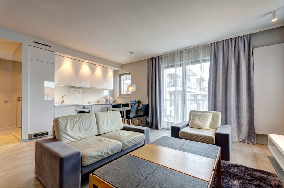 There is also a dining table and a coffee table for guests' use, which is ideal for serving drinks and snacks. 