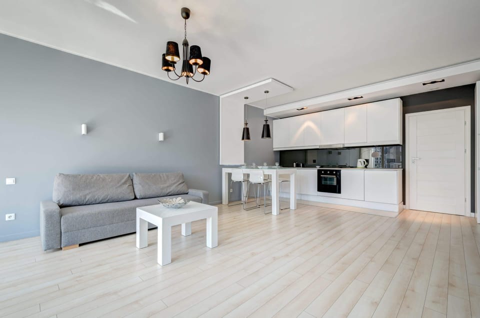 A spacious open-concept living area with a bright kitchen and dining space. Great for entertaining and everyday living.