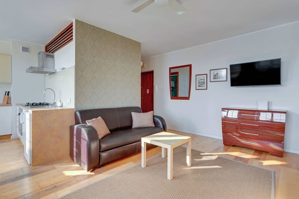 The elegant living area perfect for both relaxation and entertainment.