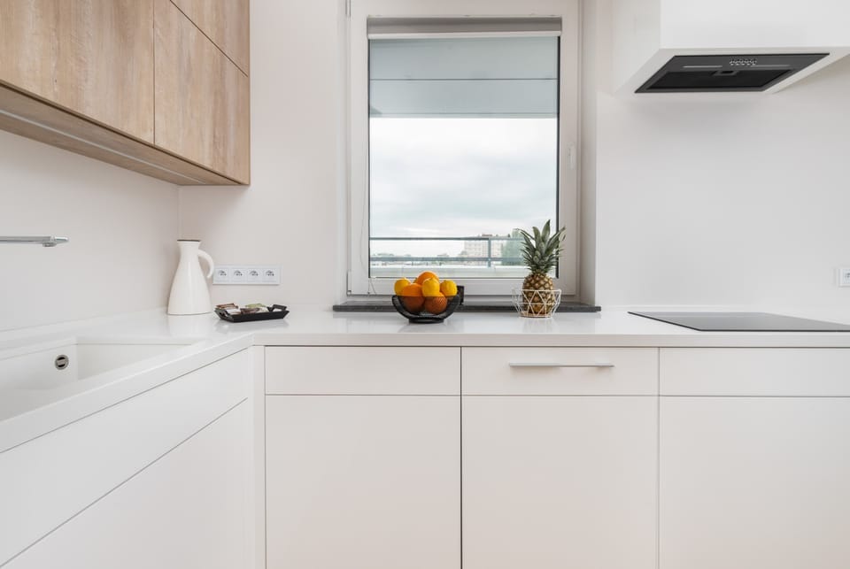 Minimalist, well-equipped kitchenette.