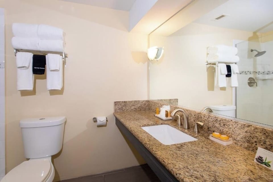 Get ready with a spacious vanity and bright mirror light.