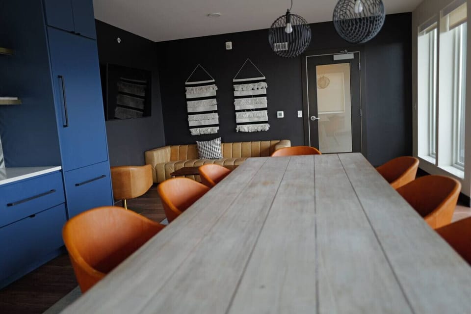 Terrace Dining Room: Enjoy vibrant meals in a stylish space with chic decor and natural light!