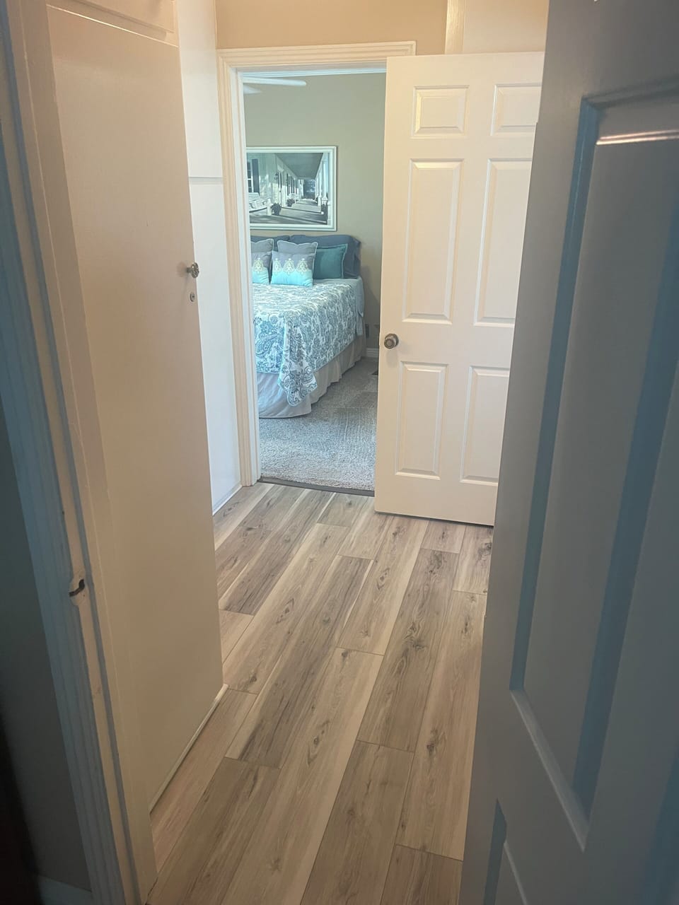 Hallway to secondary bedroom