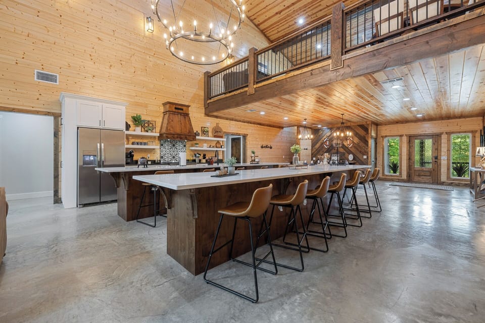 This show-stopping kitchen features a massive island with seating for the whole crew—perfect for pancake breakfasts, charcuterie spreads, or late-night laughs.