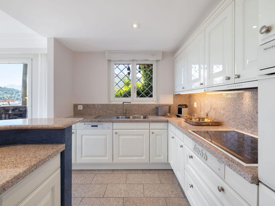 Countertop, Kitchen, Cabinetry, Interior Design, Flooring, Sink, Plumbing Fixture, Kitchen Appliance, Tap, Floor