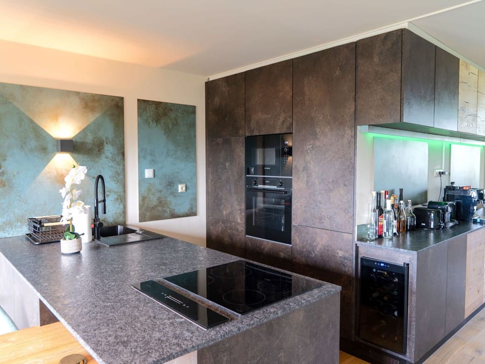 Interior Design, Flooring, Countertop, Kitchen, Wood, Floor, Furniture, Ceiling, Kitchen Appliance, Lighting