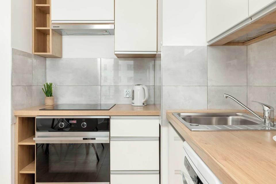 The fully equipped kitchenette includes everything you need for a home-cooked meal.