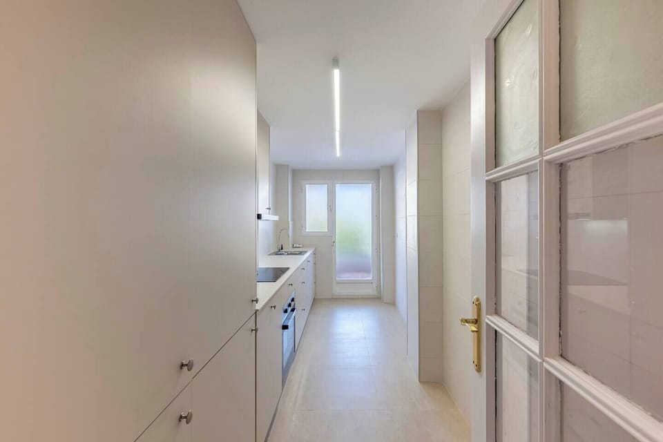 Kitchen with washer and ample storage. (4)