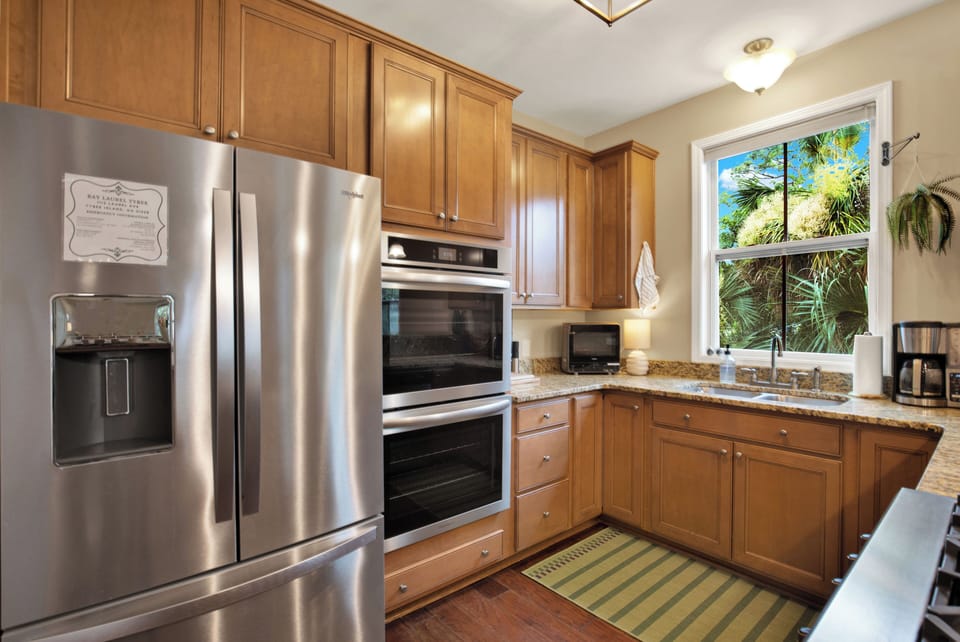 Refrigerator with ice/water in door + double ovens.