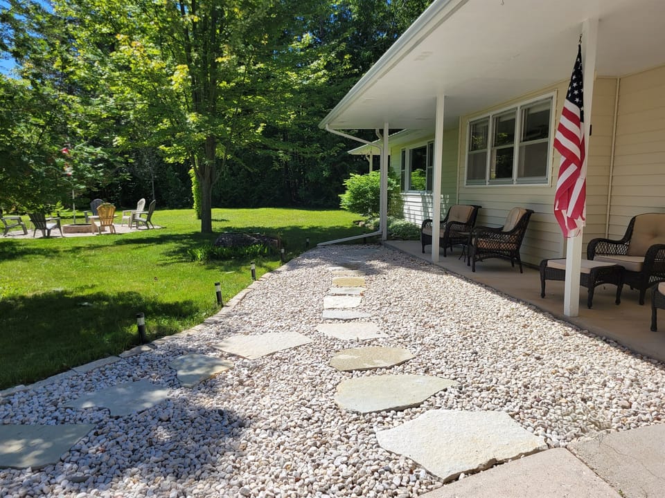 Walkway and covered seating to enjoy morning coffee