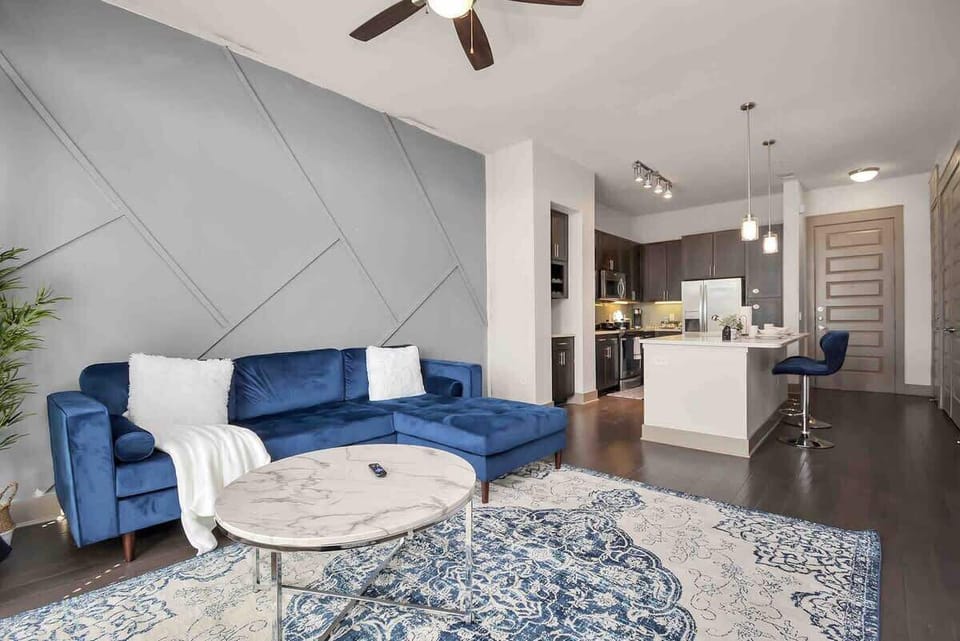 Spacious Living room with accent wall great for pictures.