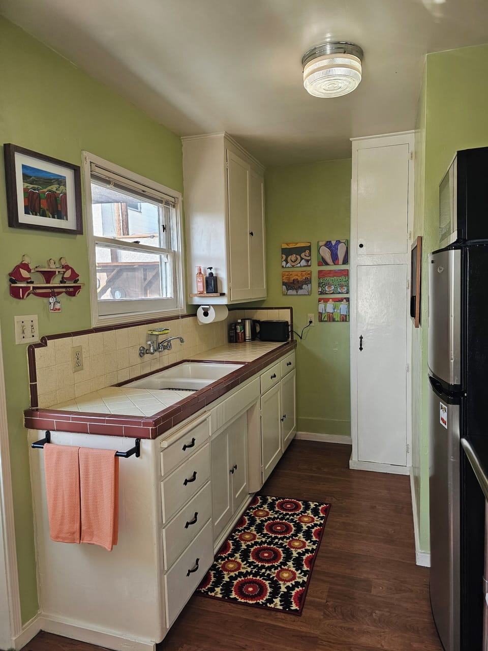 small stove/oven, fridge, coffee maker, keurig, tea kettle, pots/pans, etc