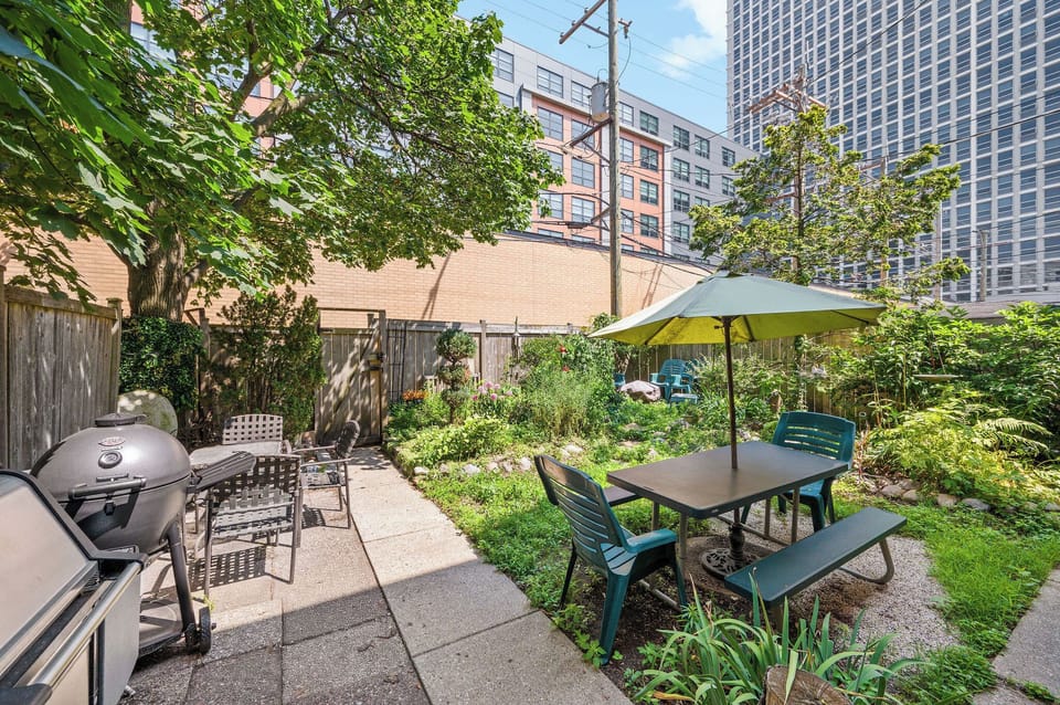 Back garden - gas and charcoal grills as well as a fire pit. 