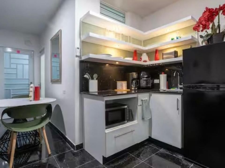 The mini kitchen is perfect for your stay.