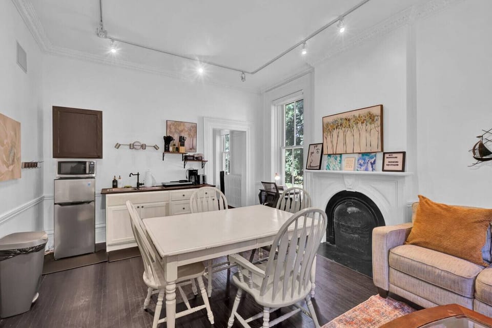 Enjoy meals and moments in this bright, inviting space. With a cozy mix of vintage charm and modern comfort, it’s perfect for coffee in the morning, casual dinners, or simply unwinding by the fireplace.