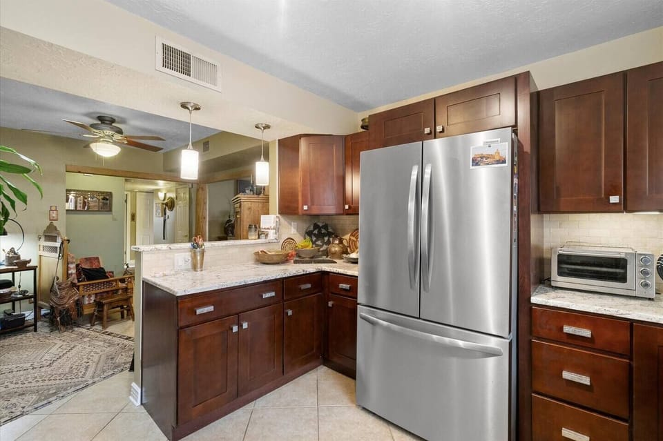 Kitchen with refrigerator
