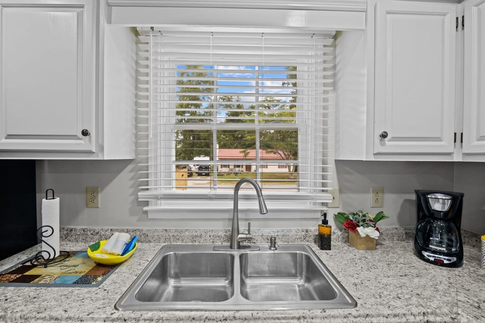 Large kitchen window brings in plenty of light.