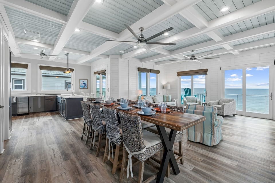 Stunning open-plan living with exposed beams and ocean views creates your perfect coastal retreat for memorable gatherings.