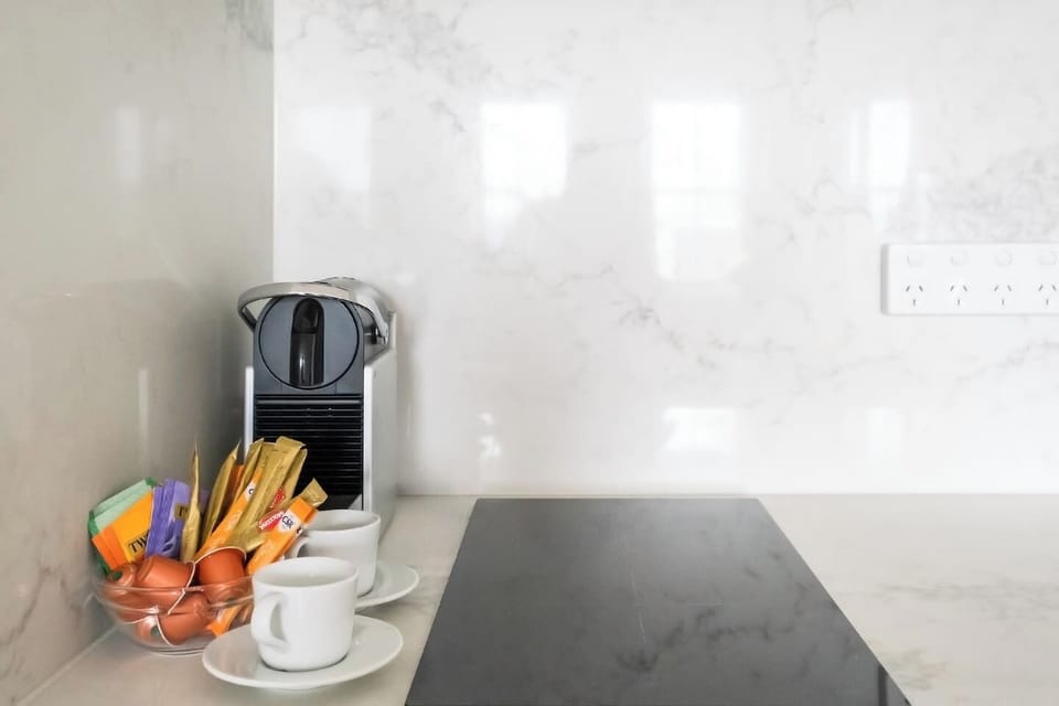Start your day right with a freshly brewed espresso at the coffee and tea station, stocked with essentials for a satisfying stay.