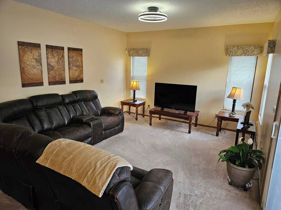 Kick back & relax with our leather reclining sectional. 