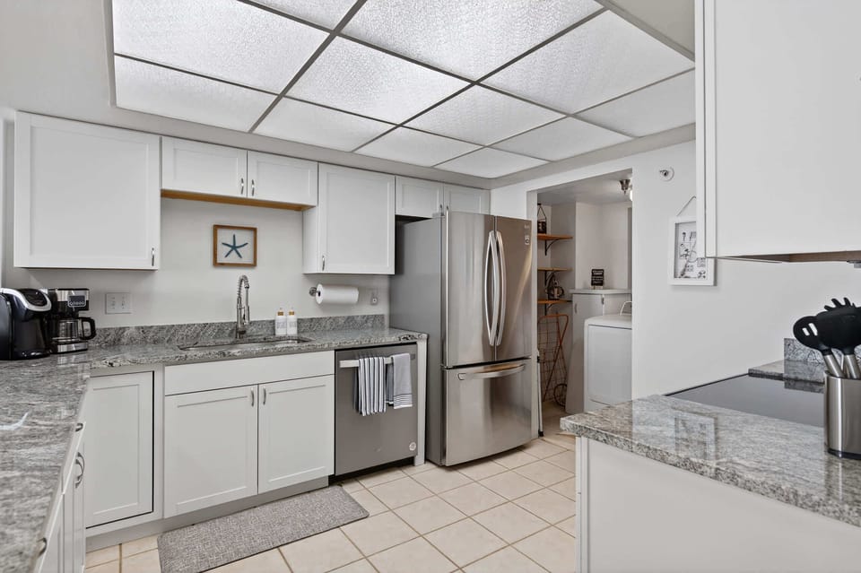 “Sleek kitchen with stainless steel finishes.”