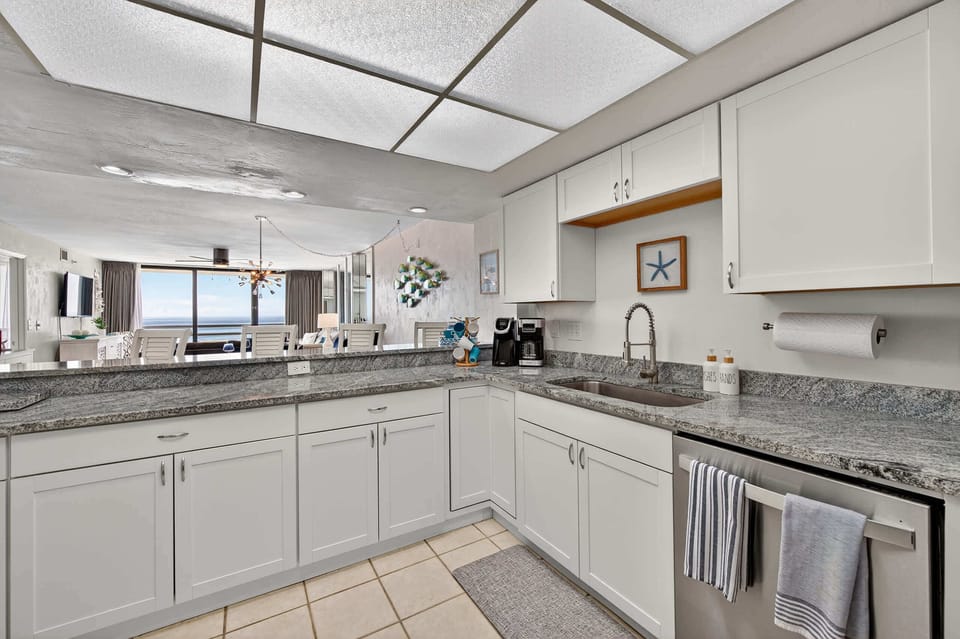 “Coastal kitchen meets modern convenience.”