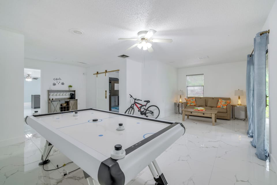 Game Room | Single-Story Home | Queen Sleeper Sofa | Air Hockey Table