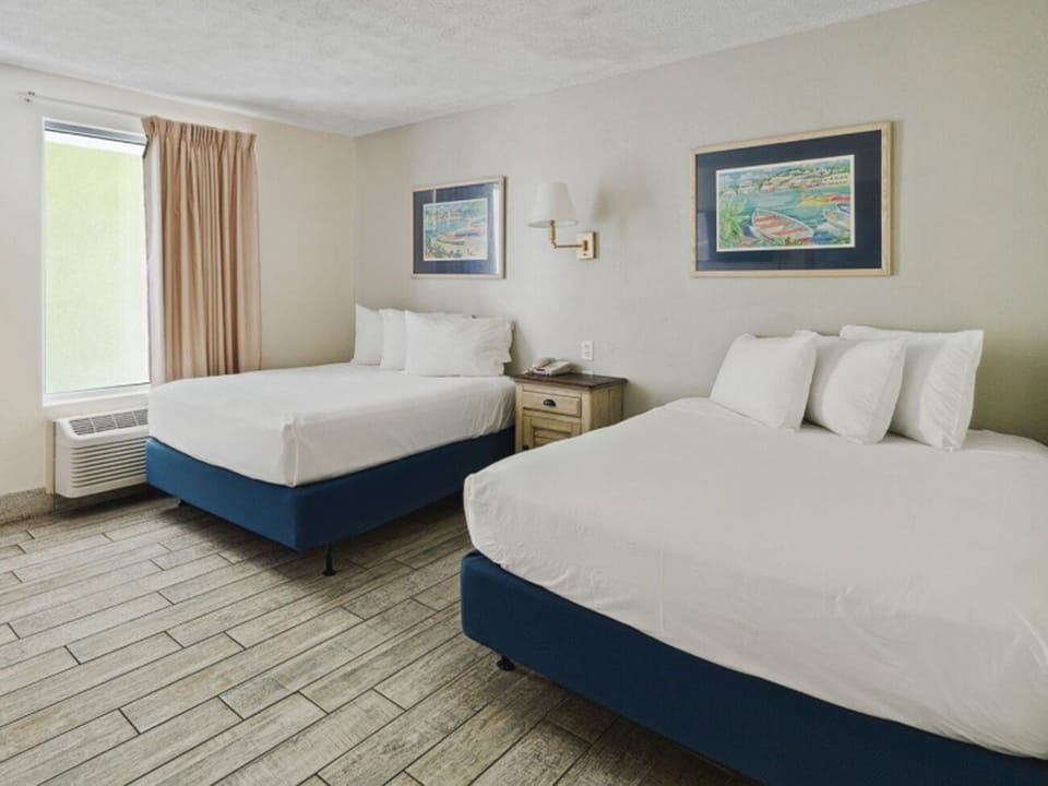 Bedroom. Exact unit will be assigned upon arrival. Views, colors, decor may vary